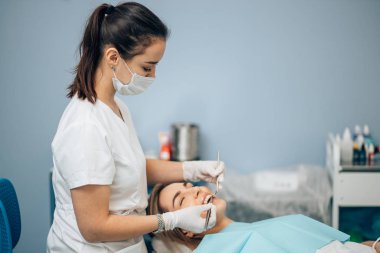 Dentist looking for spoiled teeth