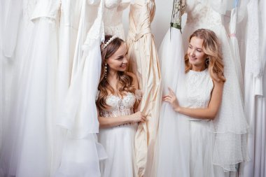 pretty young women in wedding salon