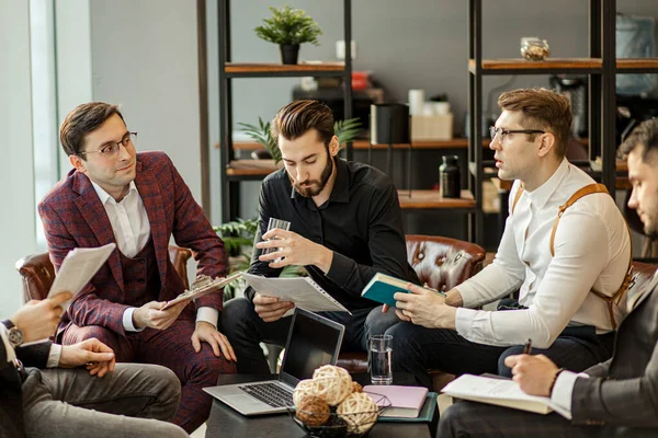 serious business people hold meeting in office