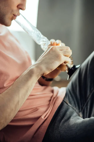 Drug user heat the bottle bong with cannabis — Stock Photo, Image