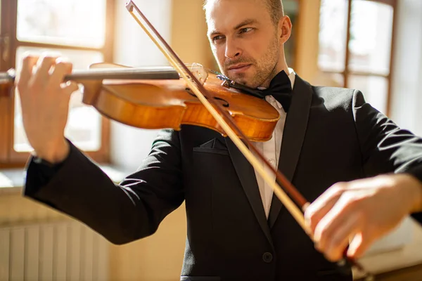 young musician violinist perform music