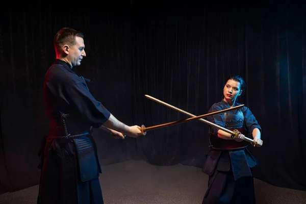 young student learn how to fight with Kendo Sword