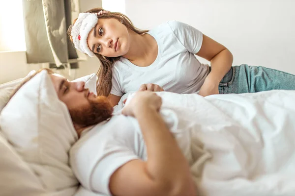 Young wife wait when her husband wakes up — Stock Photo, Image