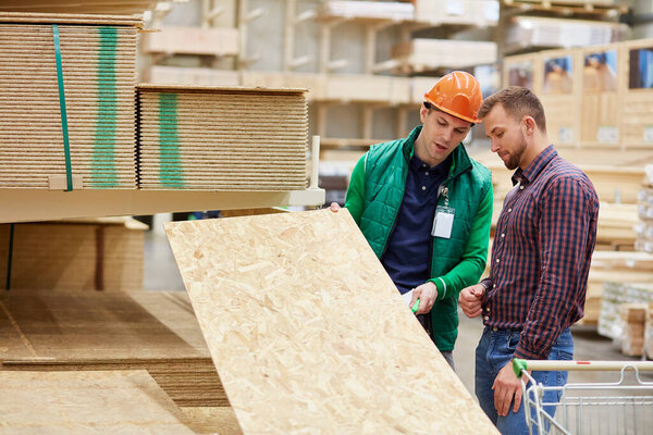 expert in his field, warehouse worker consult customer