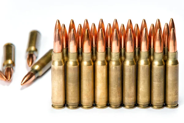 Group several rifle cartridges with reflections — Stock Photo, Image