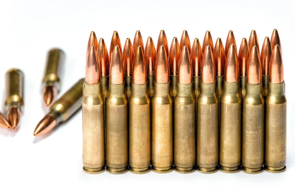 Group several rifle cartridges with reflections Royalty Free Stock Photos