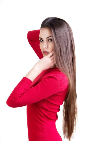 Young woman in red dress posing — Stock Photo, Image