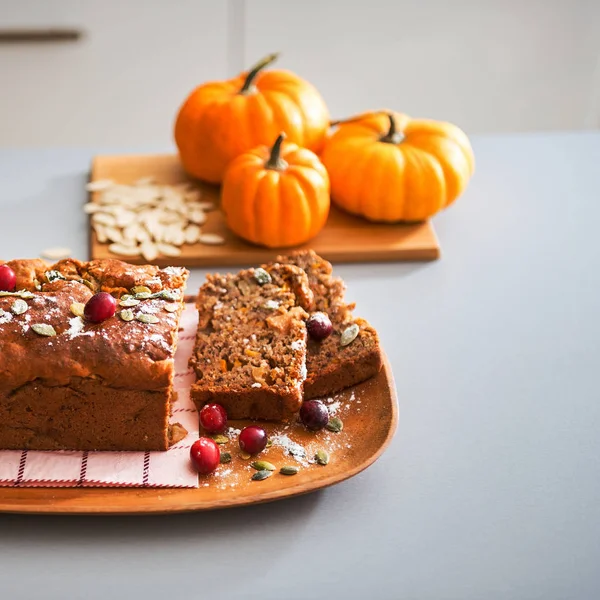 Closeup on freshly baked pumpkin bread with seeds — Stock Photo, Image