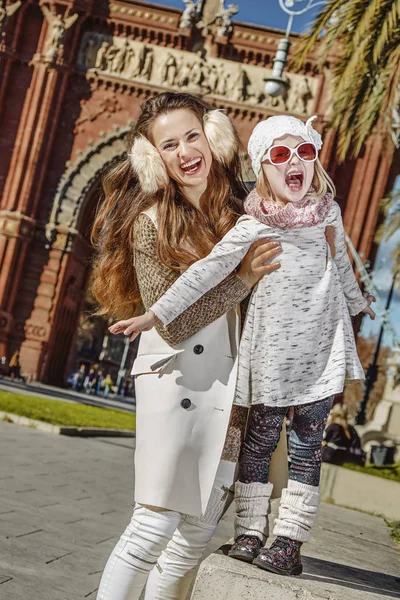 Cheerful modern mother and daughter in Barcelona, Spain — Stock Photo, Image
