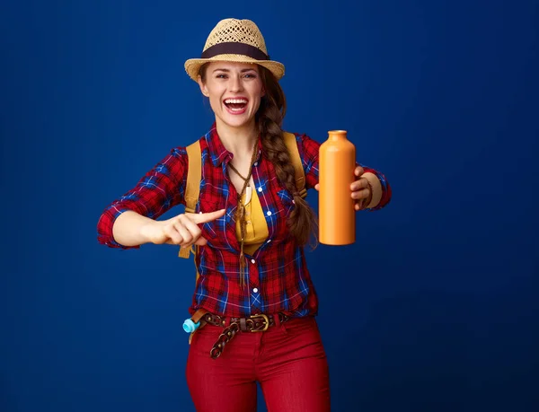 Happy Fit Tourist Woman Backpack Pointing Water Bottle — Stock Photo, Image