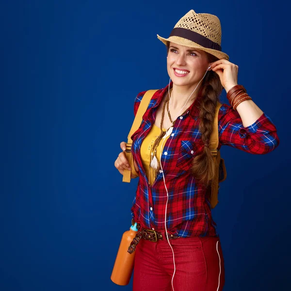 Smiling Fit Woman Hiker Plaid Shirt Listening Music Blue Background — Stock Photo, Image