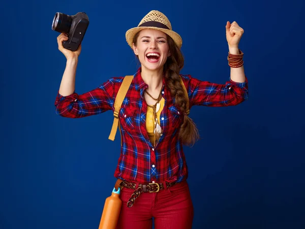 Smiling Healthy Woman Hiker Backpack Digital Camera Rejoicing Blue Background — Stock Photo, Image