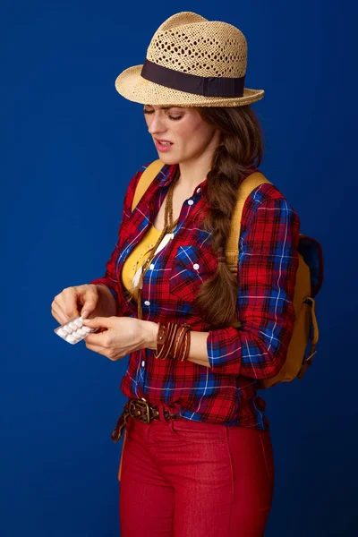 Active Ill Woman Hiker Plaid Shirt Takes Tablet Out Package — Stock Photo, Image