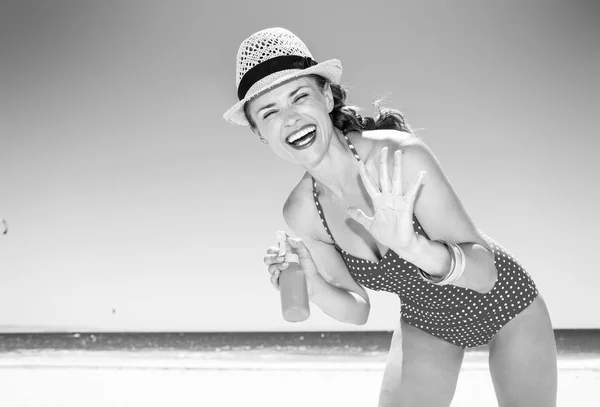 Smiling Modern Woman Swimwear Seacoast Applying Sun Cream — Stock Photo, Image