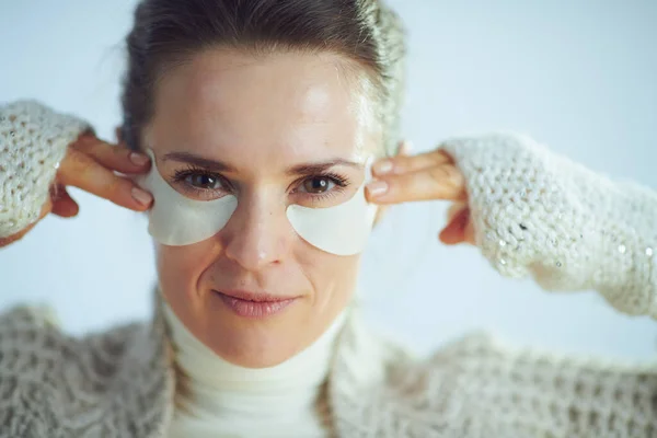 Modern woman with cosmetic eye patches — ストック写真