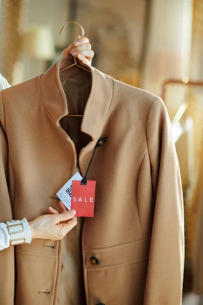 Closeup Female Modern Fashion Store Examines Sale Price Tag Coat — Stock Photo, Image