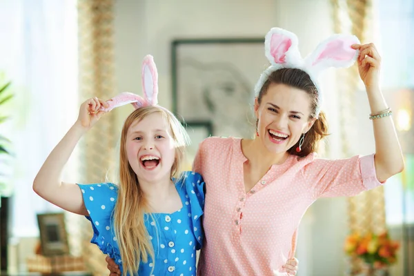 Cheerful Modern Mother Daughter Easter Bunny Ears Modern Living Room — Stock Photo, Image