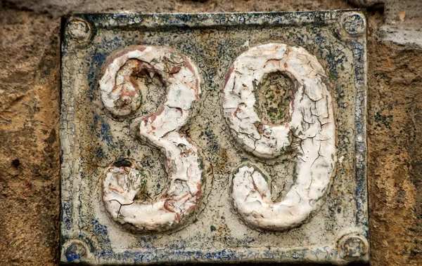 Old retro cast iron plate number 39 — Stock Photo, Image