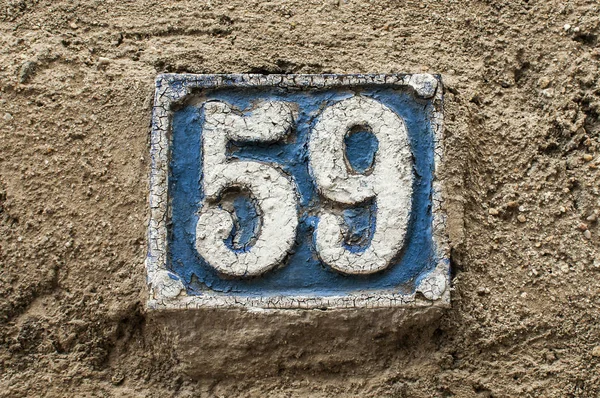 Velha placa de ferro fundido retro número 59 — Fotografia de Stock