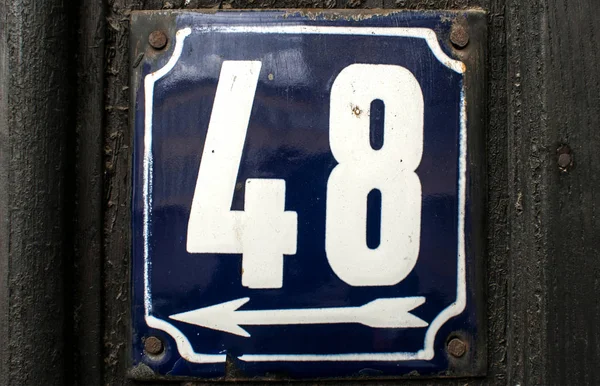 Weathered enameled plate number 48 — Stock Photo, Image