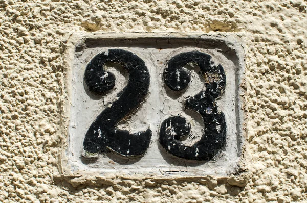 Old retro cast iron plate number 23 — Stock Photo, Image