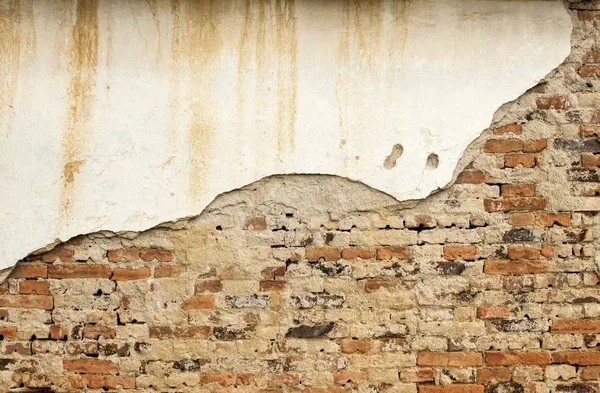 Vecchio muro di mattoni grunge intemperie — Foto Stock