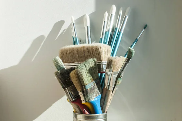 Bunch Different Types Paint Brushes Placed Tin Can White Wall — Stock Photo, Image