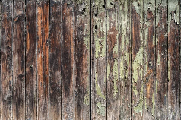 老旧的风吹日晒的 发牢骚的木板门密闭 作为木制的 发牢骚的背景 — 图库照片
