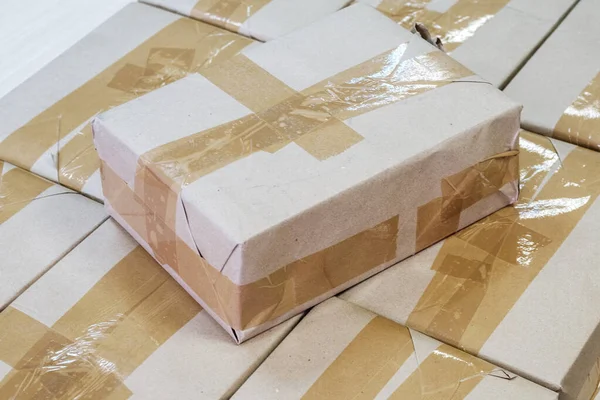 The sealed parcel is on other same parcels — Stock Photo, Image