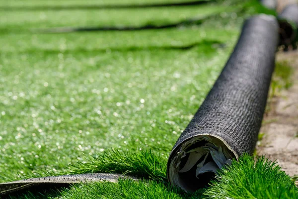 Rolls of synthetic artificial turf at the European football stadium — 스톡 사진