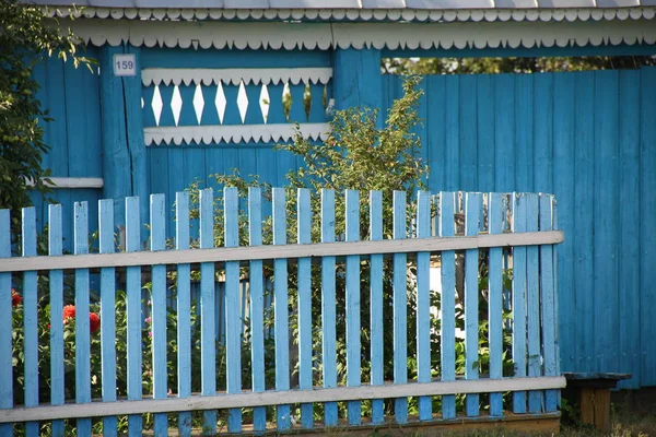 Blue yard fence