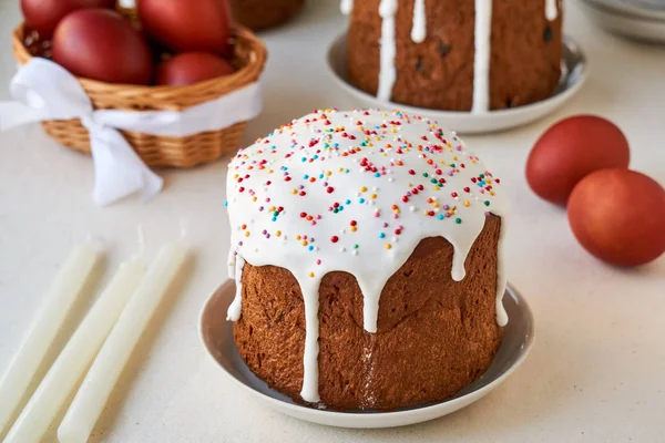 Easter cake with brown colored eggs on a light background