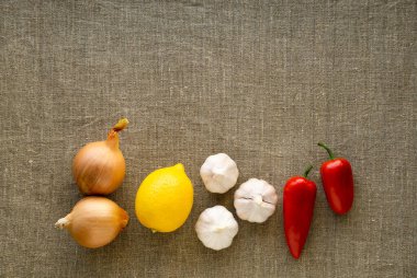 Tekstil arka planında dokunulmazlığı güçlendirmek için sebze ve meyve