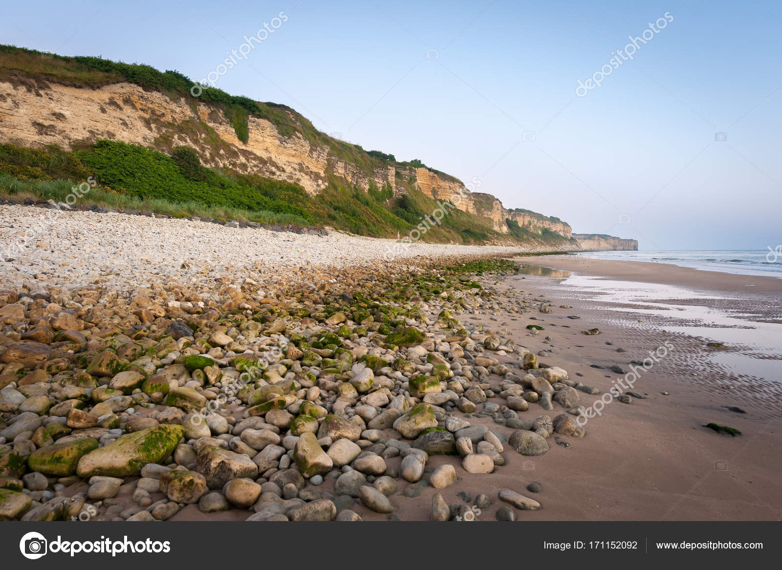 Cliffs On Omaha Beach Near Vierville Sur Mer On A Summer