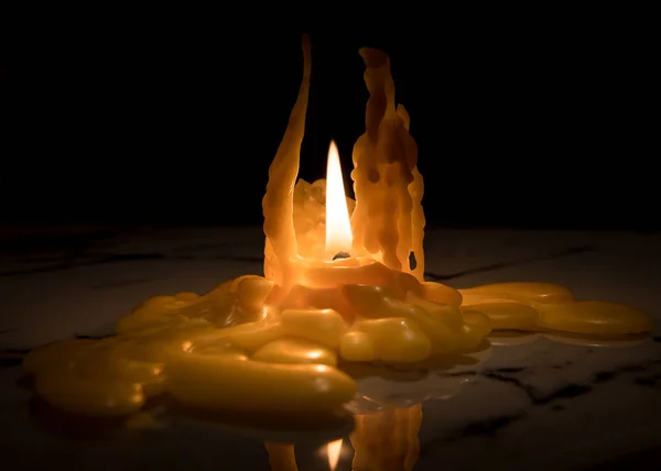 Closeup of a nearly burned down candle — Stock Photo, Image