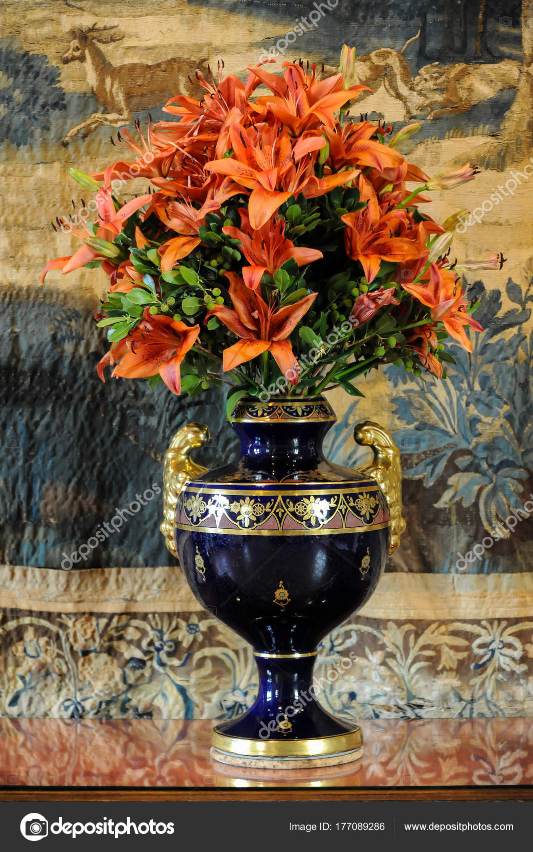 Bunch of tiger lilies in a vase — Stock Photo © coboflupi 177089286
