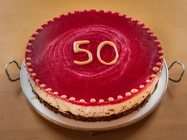 A poppy seed cake for 50th anniversary — Stock Photo, Image