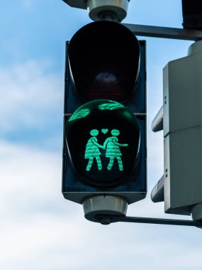Green traffic light for pedestrians in Vienna clipart