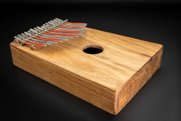 Thumb piano (Kalimba, Mbira) with silver and red tines — Stock Photo, Image