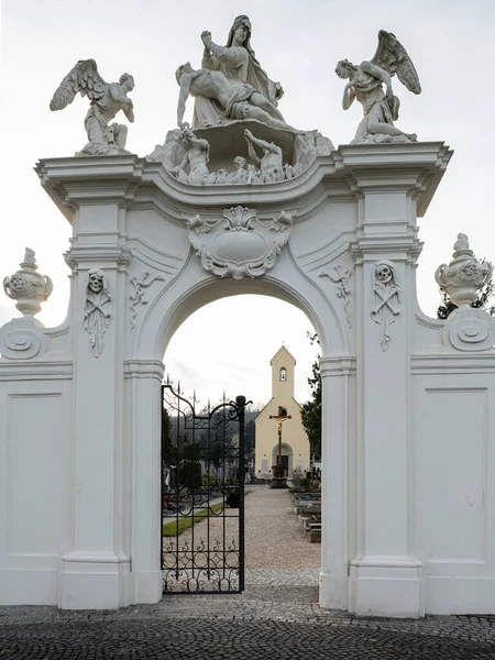 Entrance of the cemetery of Klosterneuburg on a cloudy day in winter