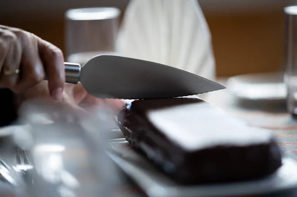 Closeup Someone Cutting Chocolate Cake Knife — Stock Photo, Image