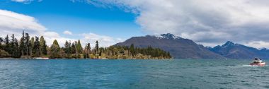 Looking away from Queenstown, towards the golf course on the South Island, New Zealand clipart