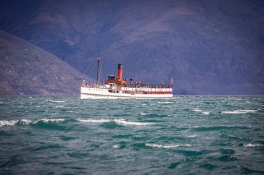 A steamboat returning to Queenstown, South Island, New Zealand. clipart