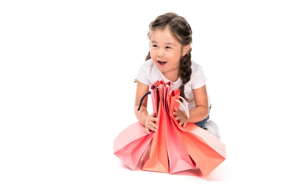 Niño con bolsas de compras — Foto de Stock