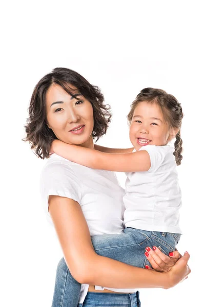 Mãe segurar nas mãos sua filha — Fotografia de Stock