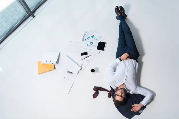 Businessman resting in office — Stock Photo