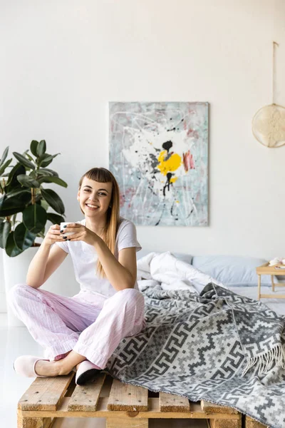 Smiling Woman Cup Coffee Hands Sitting Bed Morning — Free Stock Photo