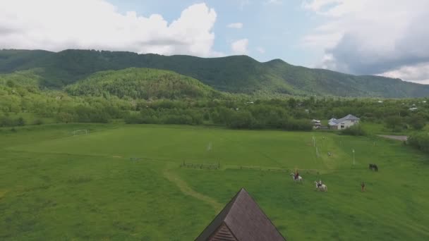 Panorama of a Glade, Football Field and Mountains — Stock Video