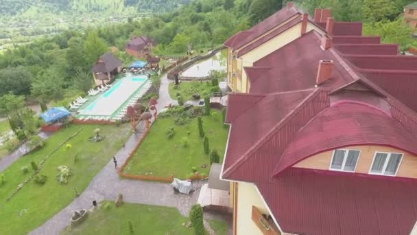 Roof of a Tourist Complex, Pool and Pond — Stock Footage Roof of a Tourist Complex, Pool and Pond Stock Footage