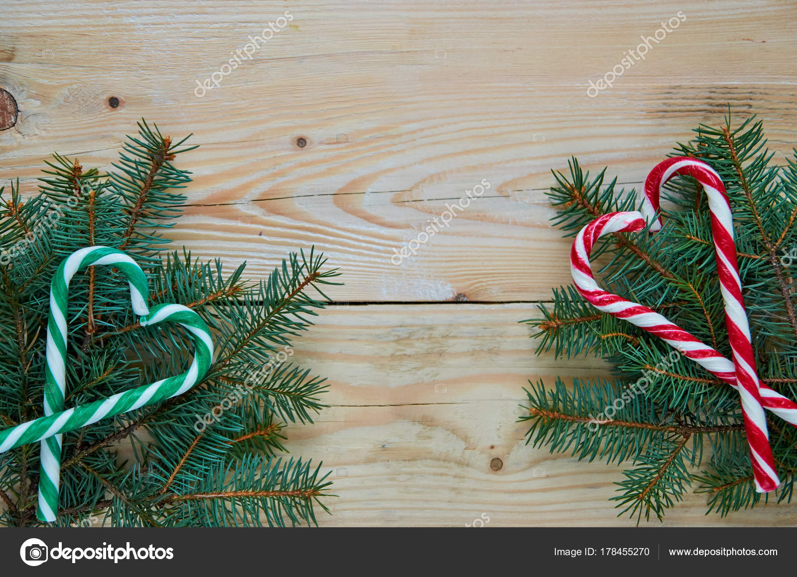 green and red hearts of candy cones and christmas tree branches with free copy space on the center new year or valentines day sweets decorations with fir - Free Christmas Images To Copy green and red hearts of candy cones and christmas tree branches with free copy space on the center new year or valentines day sweets decorations with fir - Free Christmas Images To Copy